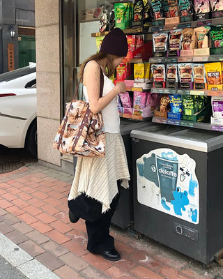 Unique strap cut-off midi skirt