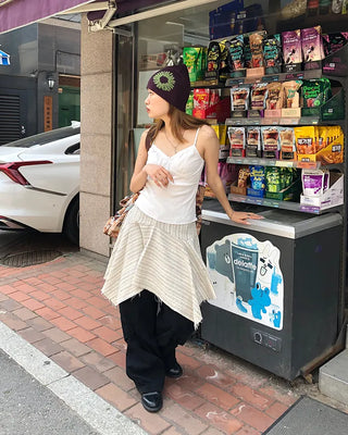 Unique strap cut-off midi skirt