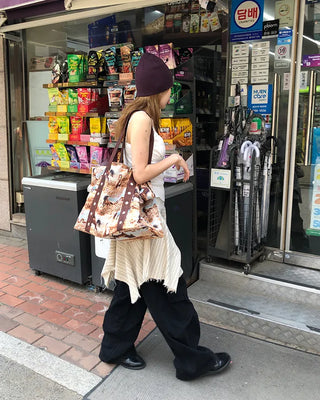 Unique strap cut-off midi skirt