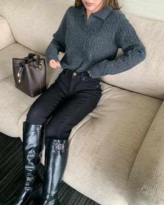 Open-collar cable knit sweater
