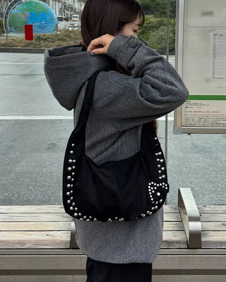 Studded suede shoulder bag