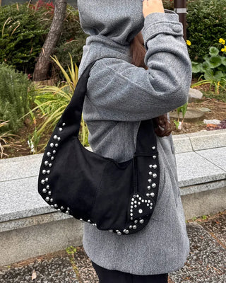 Studded suede shoulder bag