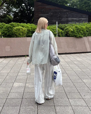 Drawstring net pocket backpack