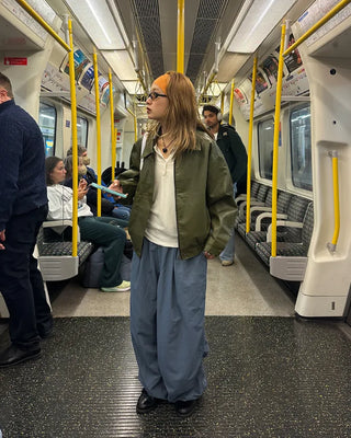 Black button-up elastic waist parachute pants