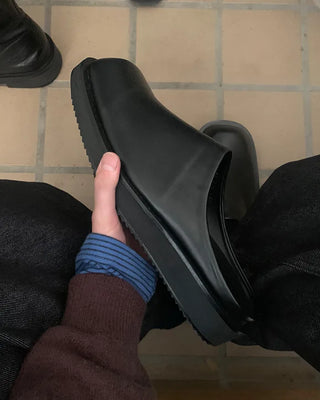 Simple black clogs