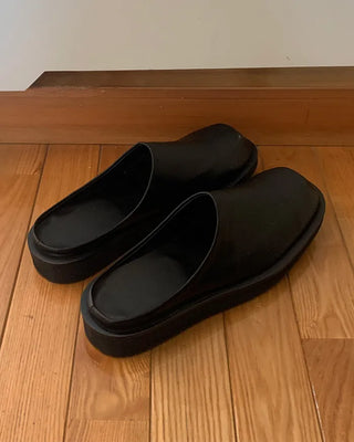 Simple black clogs