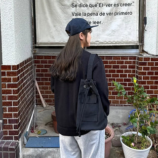 Canvas pocket sling bag