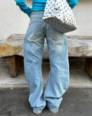 Low-waist curved light denim jeans
