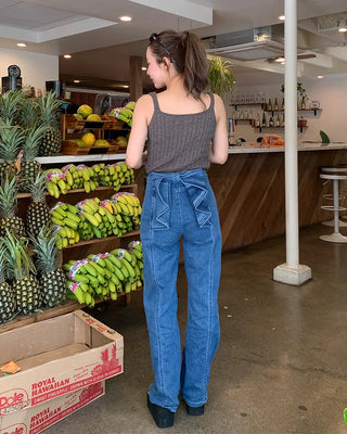 Back ribbon flared denim pants