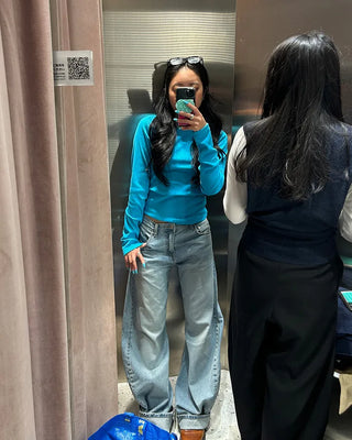 Low-waist curved light denim jeans