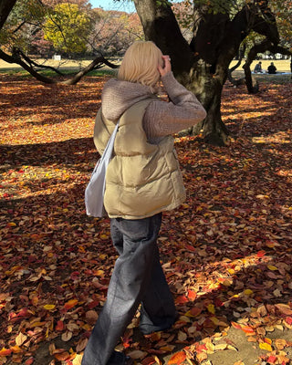 High-neck flap pocket faux down vest