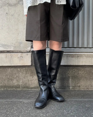 Side-seam almond-toe long boots