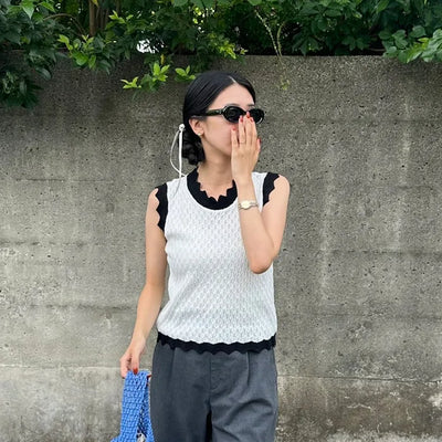 Two-tone perforated sleeveless knit