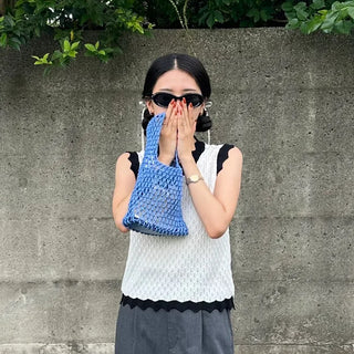 Two-tone perforated sleeveless knit