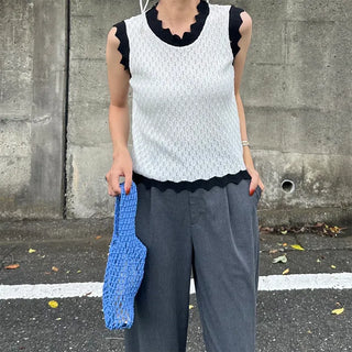 Two-tone perforated sleeveless knit