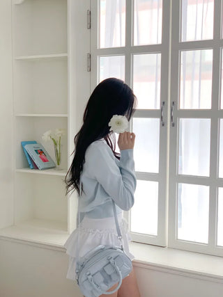 Round knit cardigan