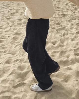 Wide cotton slacks with pleats