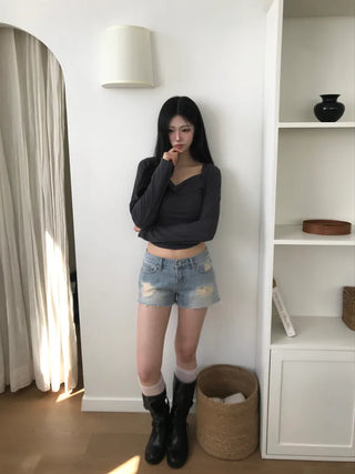 Distressed denim shorts