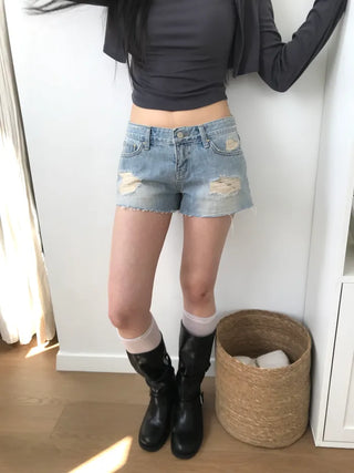 Distressed denim shorts