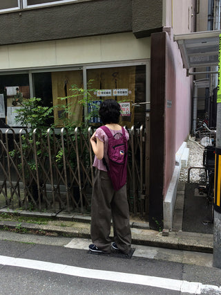 Wide-leg pants with elastic waistband and slits
