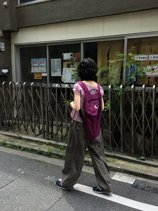 Wide-leg pants with elastic waistband and slits