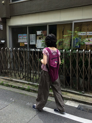 Wide-leg pants with elastic waistband and slits