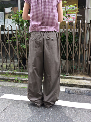 Wide-leg pants with elastic waistband and slits