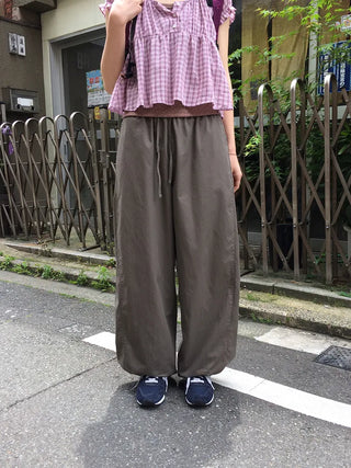 Wide-leg pants with elastic waistband and slits