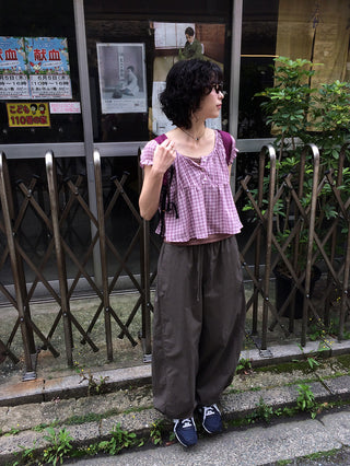 Wide-leg pants with elastic waistband and slits