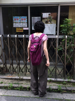 Wide-leg pants with elastic waistband and slits