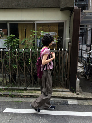 Wide-leg pants with elastic waistband and slits