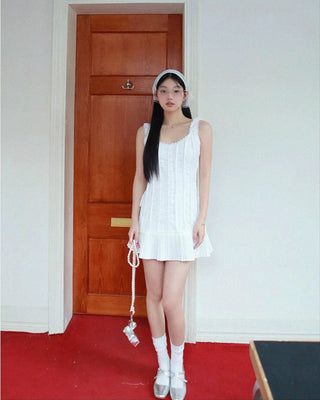 Sleeveless pleated Mini dress