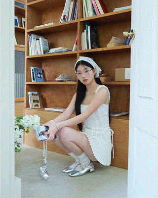 Sleeveless pleated Mini dress