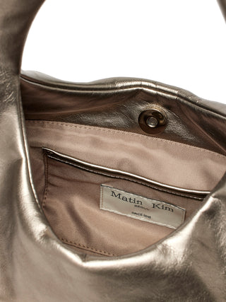 EMBOSSED LOGO LEATHER MINI TOTE BAG IN CHAMPAGNE