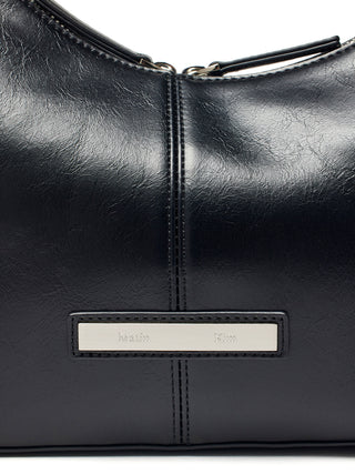 ASYMMETRICAL ZIPPER BAG IN BLACK