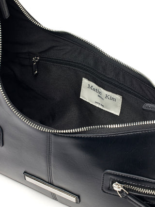 ASYMMETRICAL ZIPPER BAG IN BLACK
