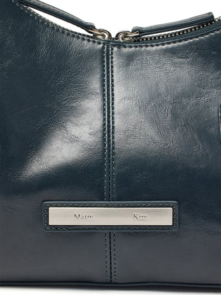 ASYMMETRICAL ZIPPER BAG IN CHARCOAL