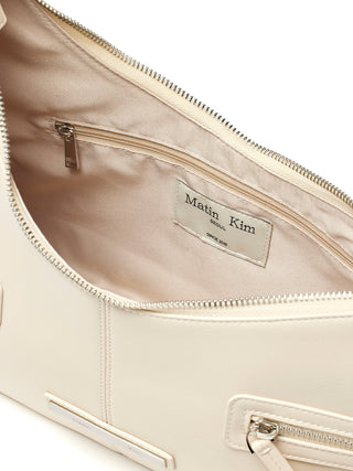 ASYMMETRICAL ZIPPER BAG IN IVORY