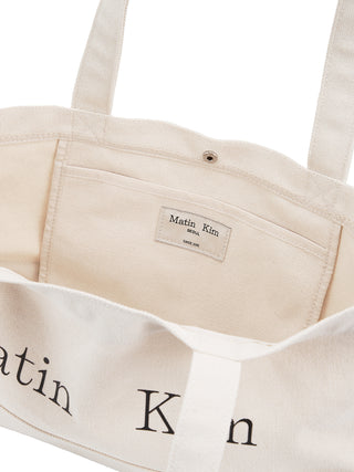 MATIN LOGO CANVAS WIDE SHOULDER BAG IN IVORY