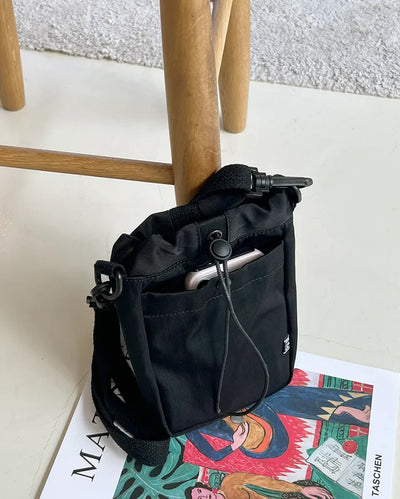 Roasted string mini crossbody bag