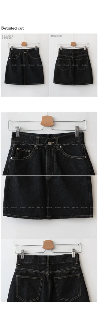 Low denim black mini skirt
