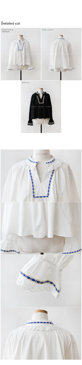 Lace-trimmed blouse top