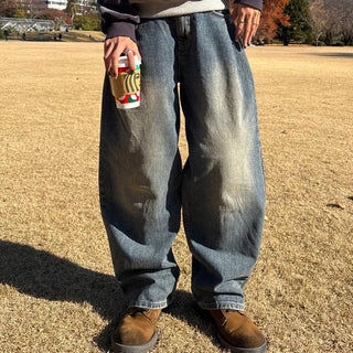 Pleated wide-leg denim pants