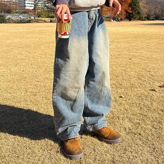 Pleated wide-leg denim pants