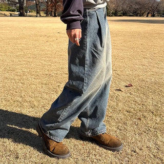 Pleated wide-leg denim pants