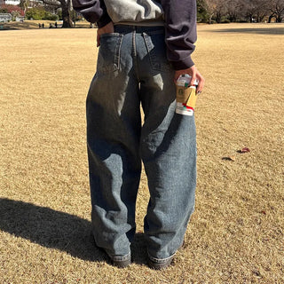 Pleated wide-leg denim pants