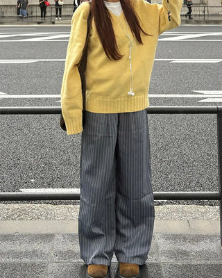 V-neck ribbed hem loose sweater