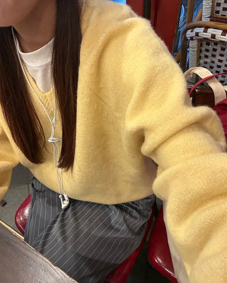 V-neck ribbed hem loose sweater