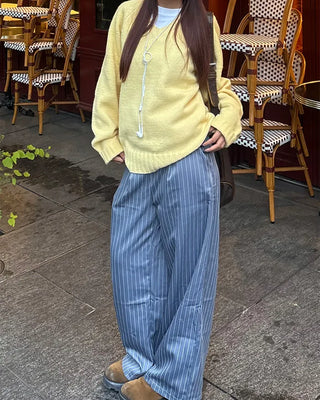 V-neck ribbed hem loose sweater