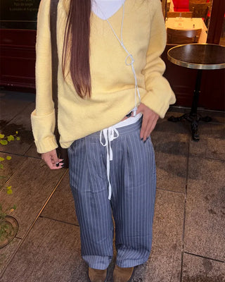 V-neck ribbed hem loose sweater